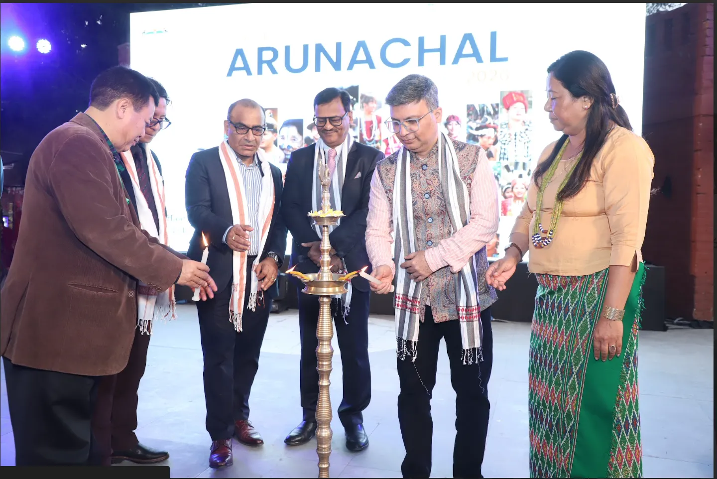 Ceremonial lamp lighting at a state tourism flagship event